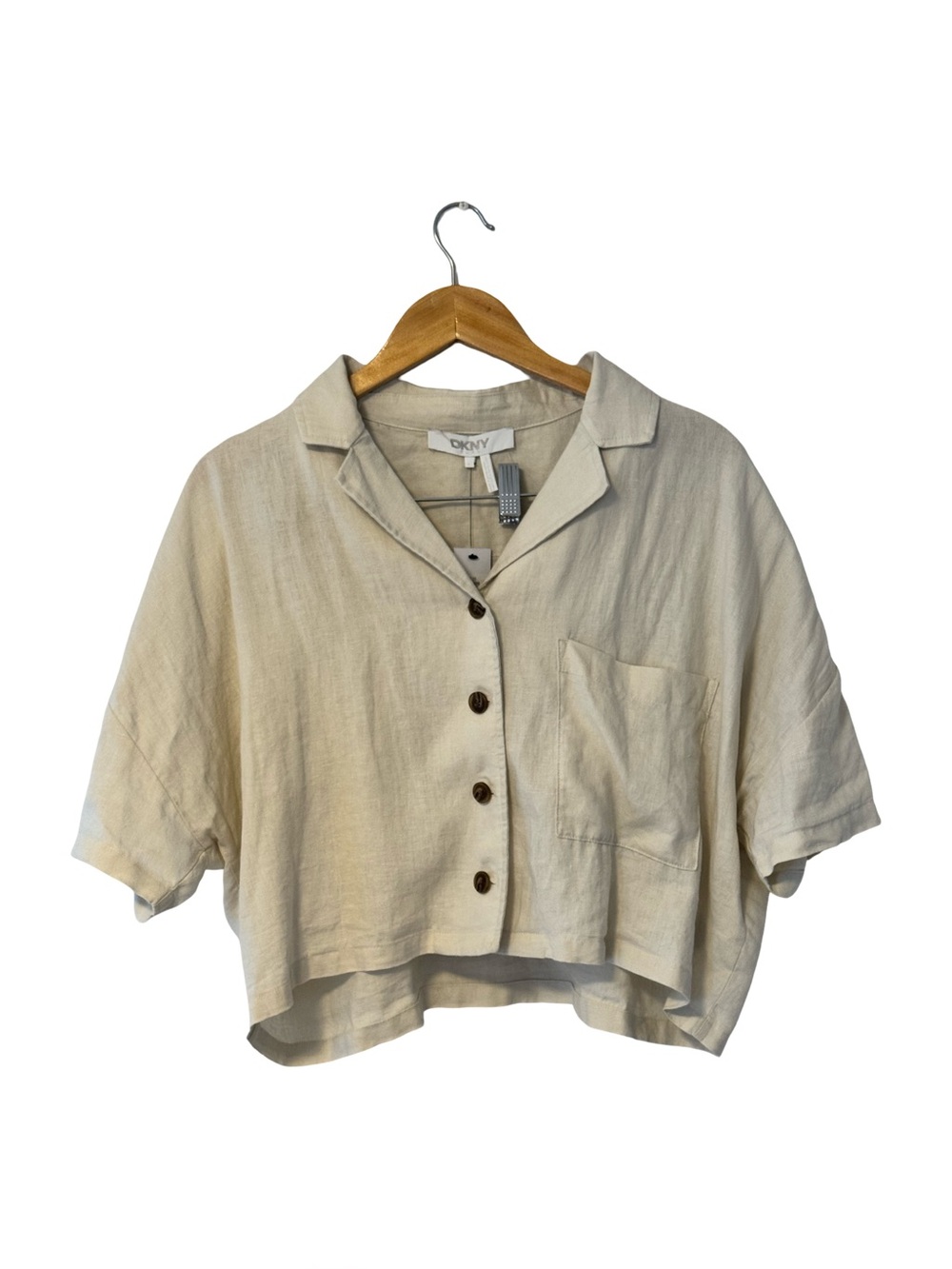 Shirt or short jacket. Made of linen, with short sleeves.